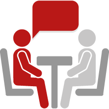 Icon of two people sitting in an interview